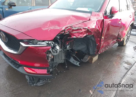 2021 Mazda Cx-5 Grand Touring z USA, uszkodzony, nr VIN JM3KFBDM2M0432134